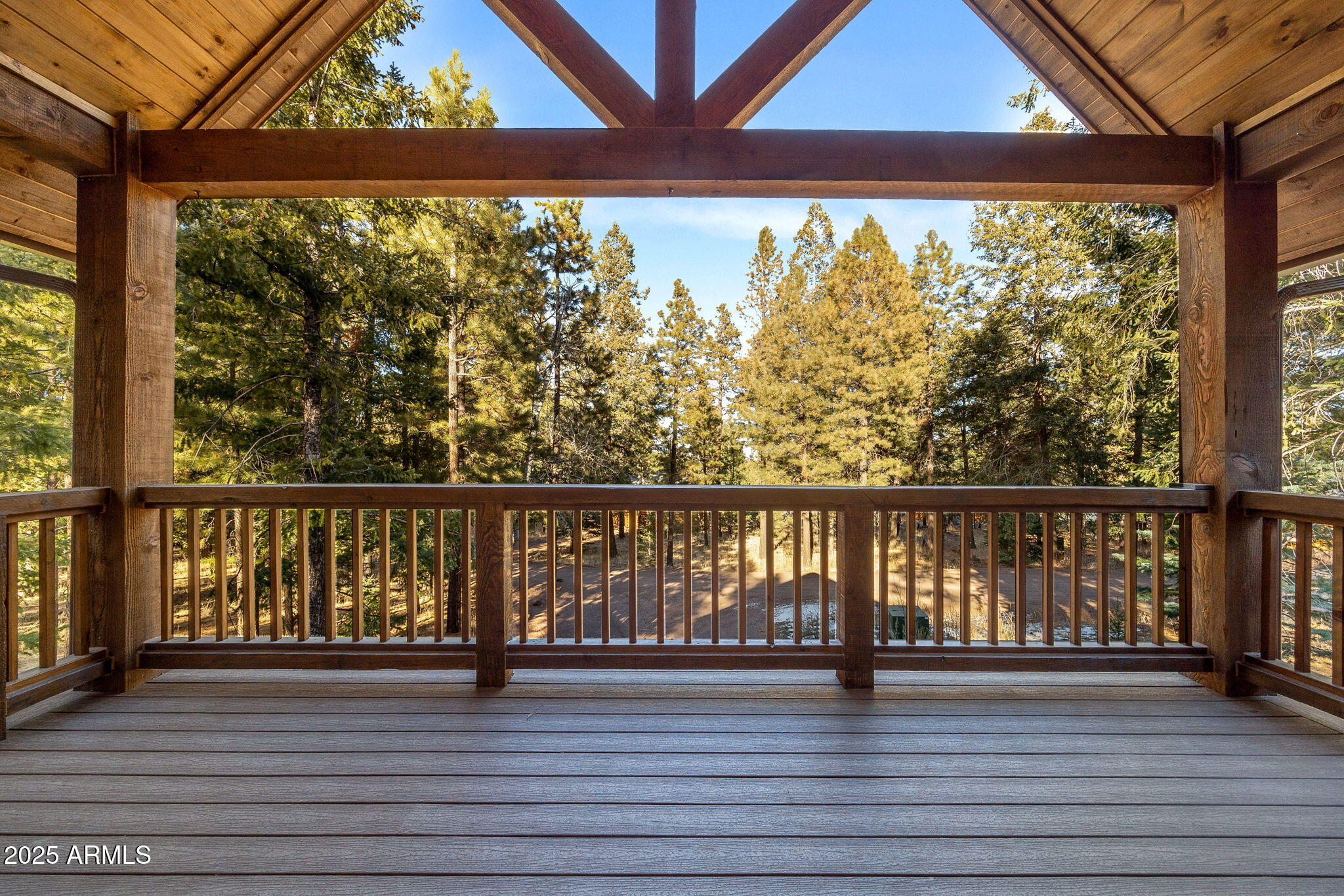 90 North 1330th Road Greer, AZ 85927 - Photo 14 of 44 a view of wooden floor with a floor to ceiling window and wooden floor