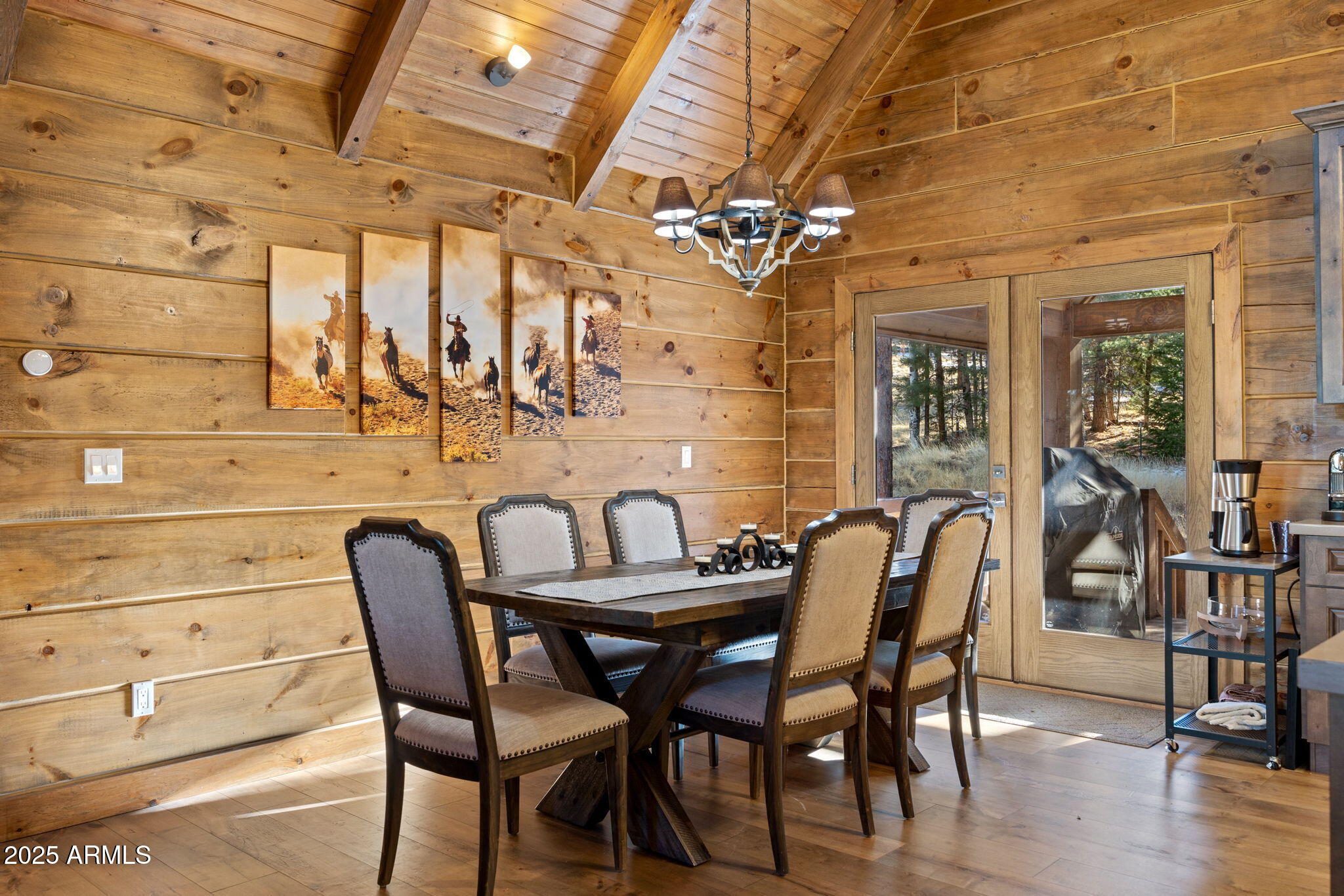 90 North 1330th Road Greer, AZ 85927 - Photo 20 of 44 a dining room with furniture and wooden floor
