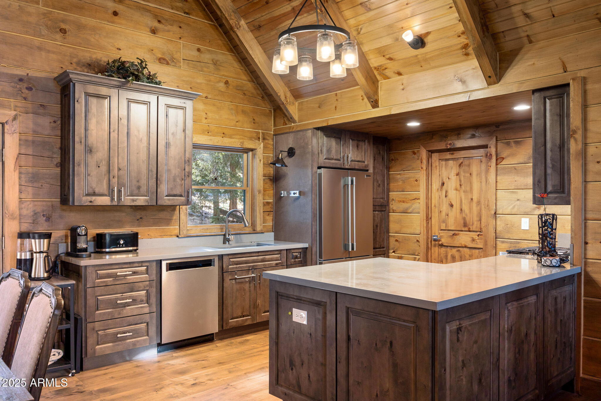 90 North 1330th Road Greer, AZ 85927 - Photo 21 of 44 a kitchen with a sink and cabinets