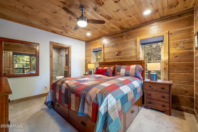 a kitchen with a stove top oven and cabinets