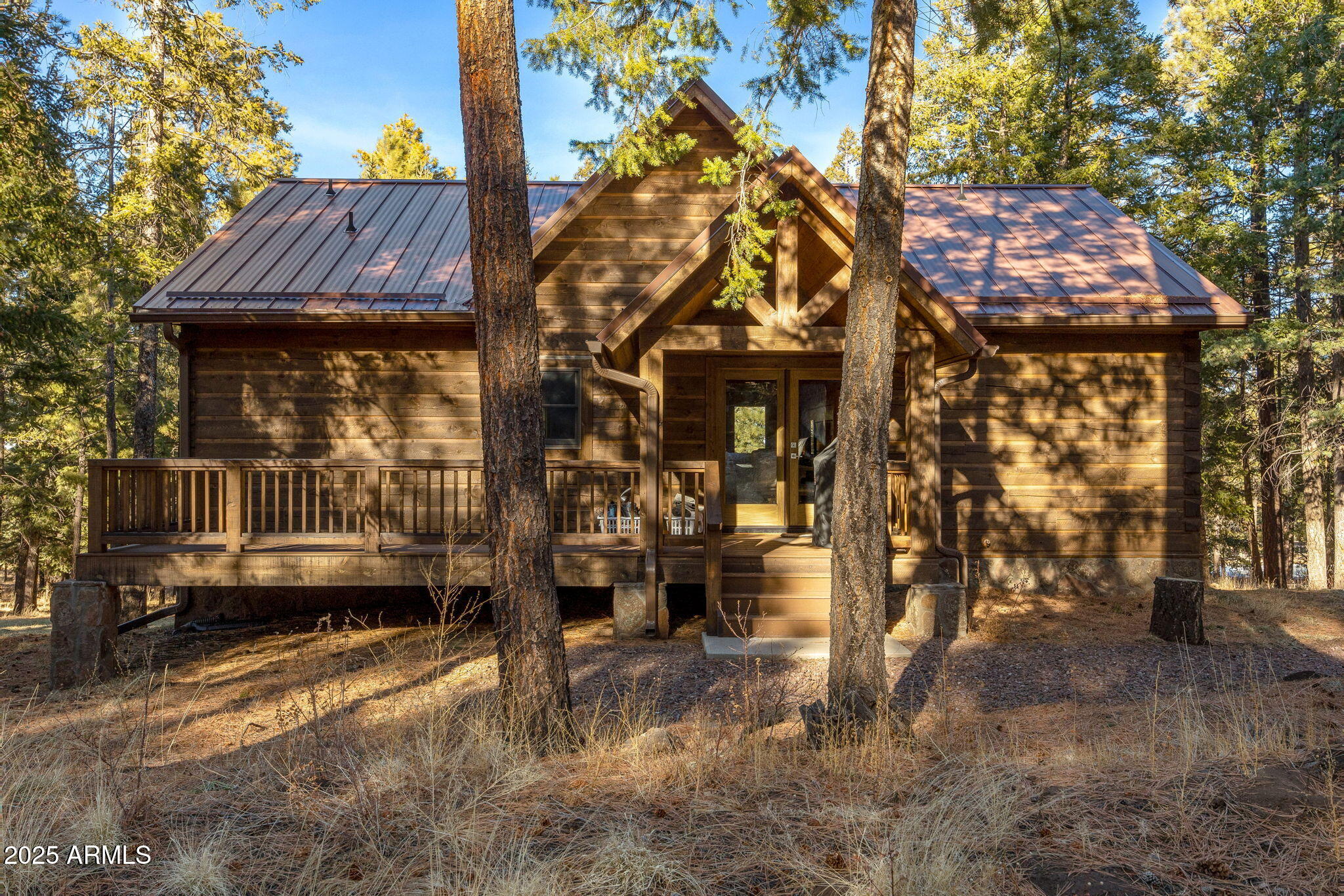 90 North 1330th Road Greer, AZ 85927 - Photo 2 of 44 a view of house with a yard