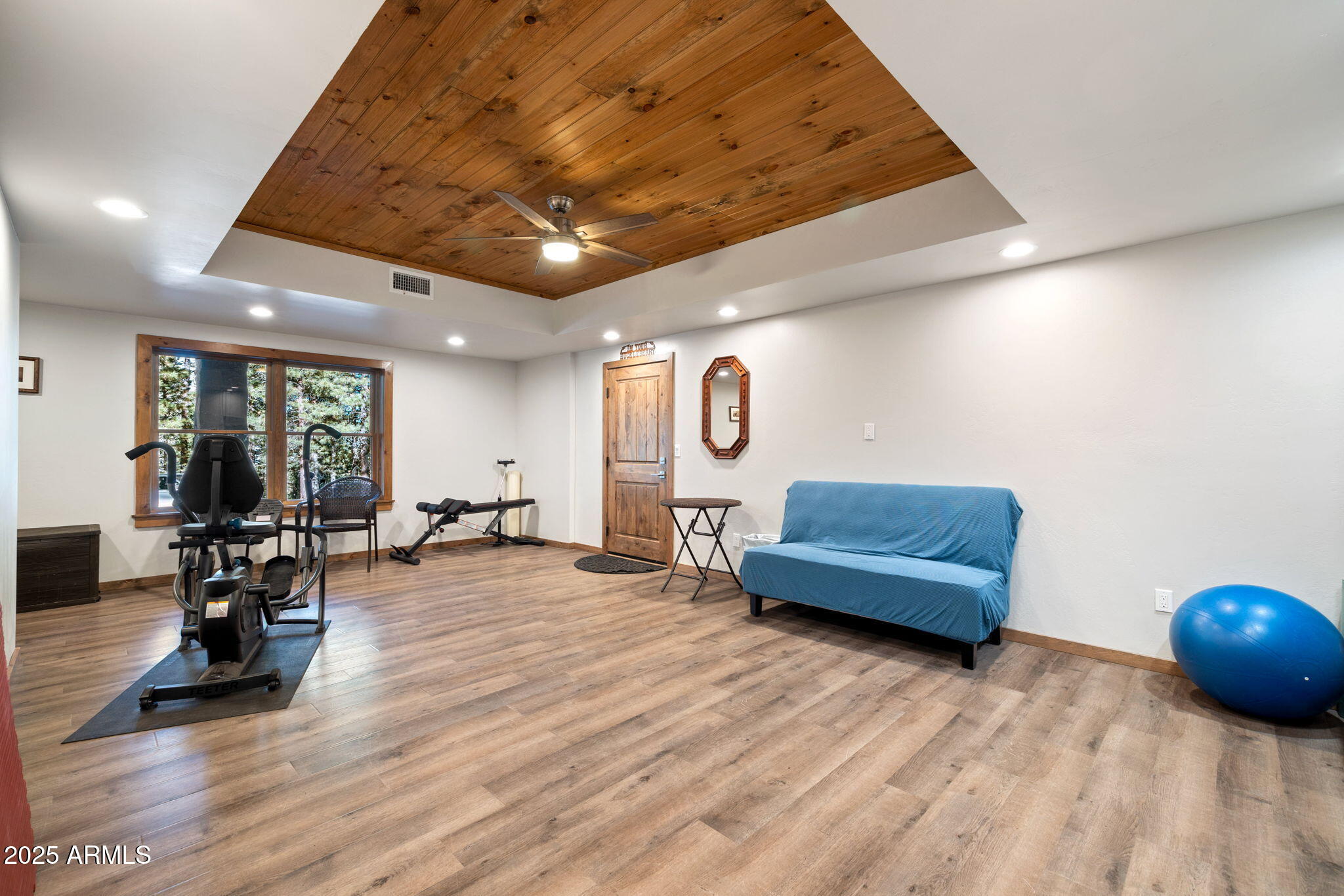 90 North 1330th Road Greer, AZ 85927 - Photo 34 of 44 a living room with furniture and wooden floor