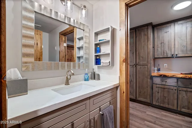 a bedroom with bed and lamp