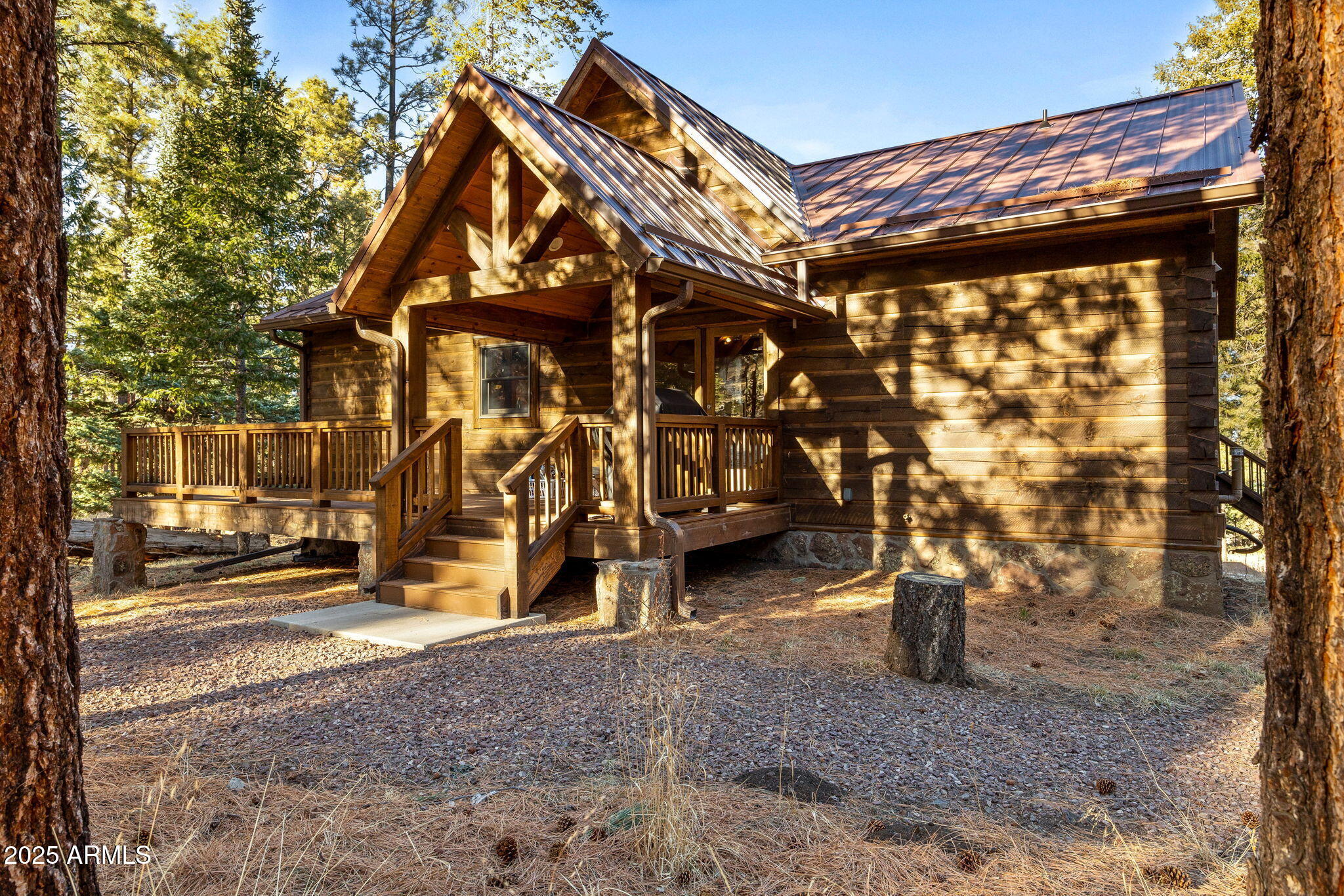 90 North 1330th Road Greer, AZ 85927 - Photo 4 of 44 a backyard of a house with barbeque oven table and chairs