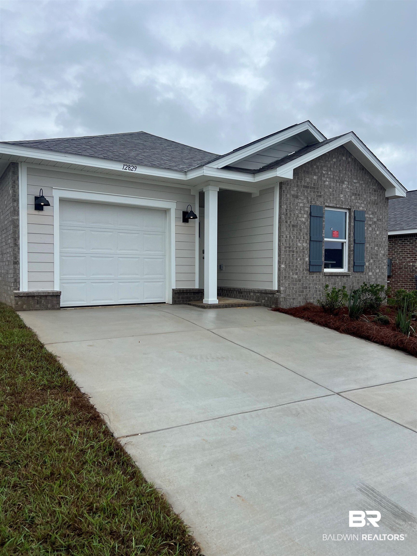 12829 Patriot Way Daphne, AL 36527 - Photo 4 of 38 Ranch-style home featuring a garage