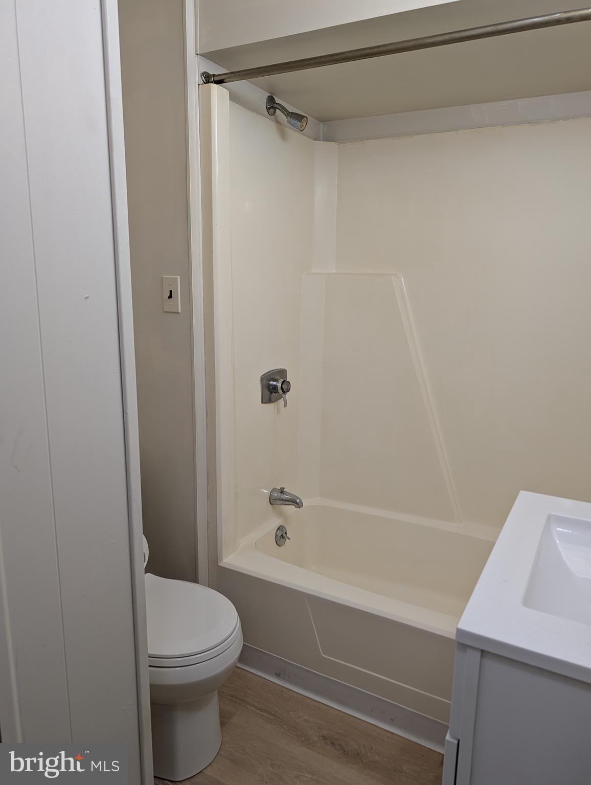 238 Main Street, Unit 3 Hellertown, PA 18055 - Photo 4 of 8 a bathroom with a shower and a toilet