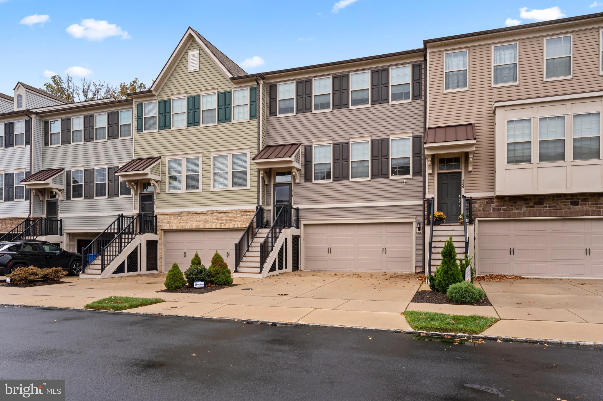 484 Rowan Street Warminster, PA 18974 - Photo 2 of 37 a front view of a house with a yard and a garage