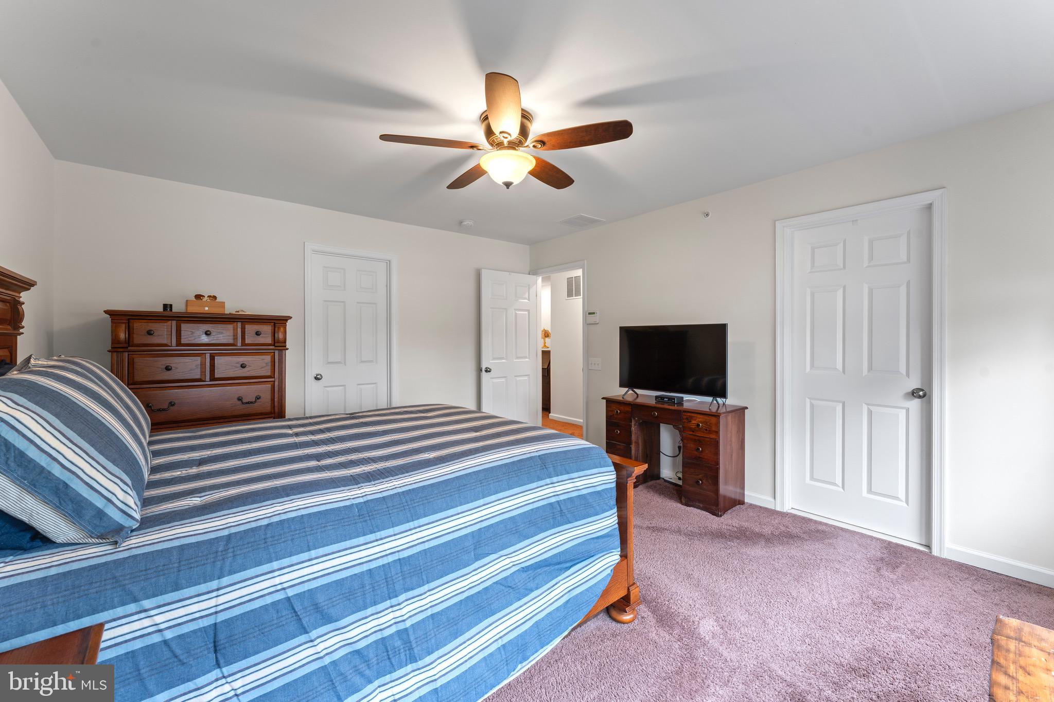 484 Rowan Street Warminster, PA 18974 - Photo 23 of 37 a bedroom with furniture and a flat screen tv