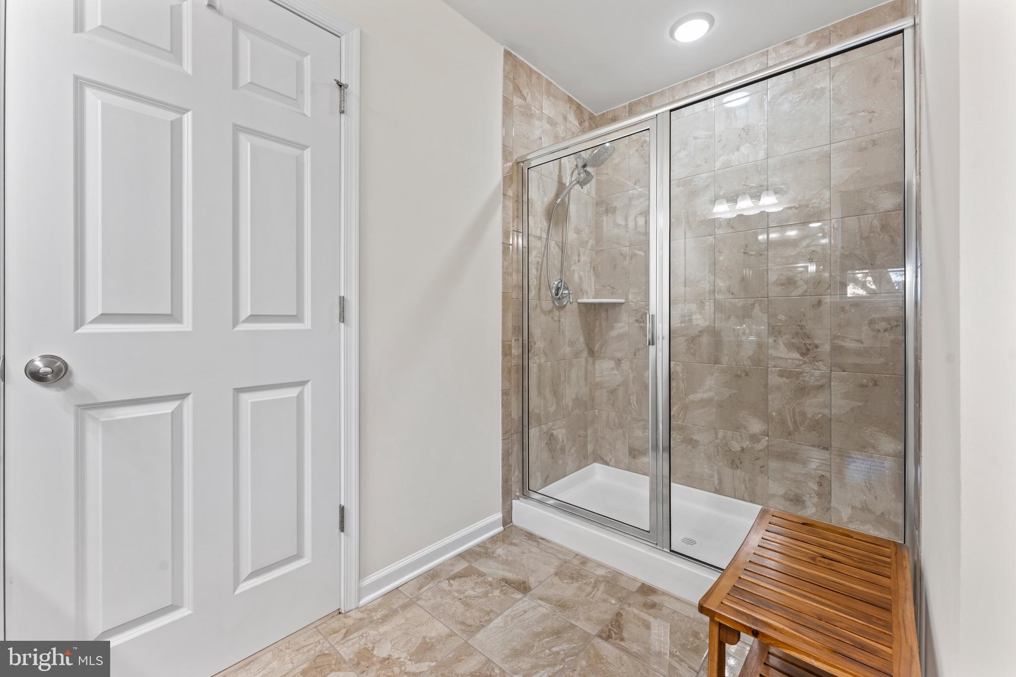 484 Rowan Street Warminster, PA 18974 - Photo 26 of 37 a bathroom with a glass shower door