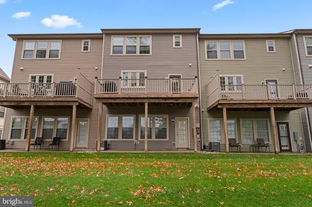 a view of a house with roof deck