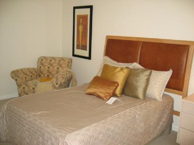 471 Live Oak Drive Mill Valley, CA 94941 - Photo 7 of 11 a large bed sitting in a bedroom next to a window