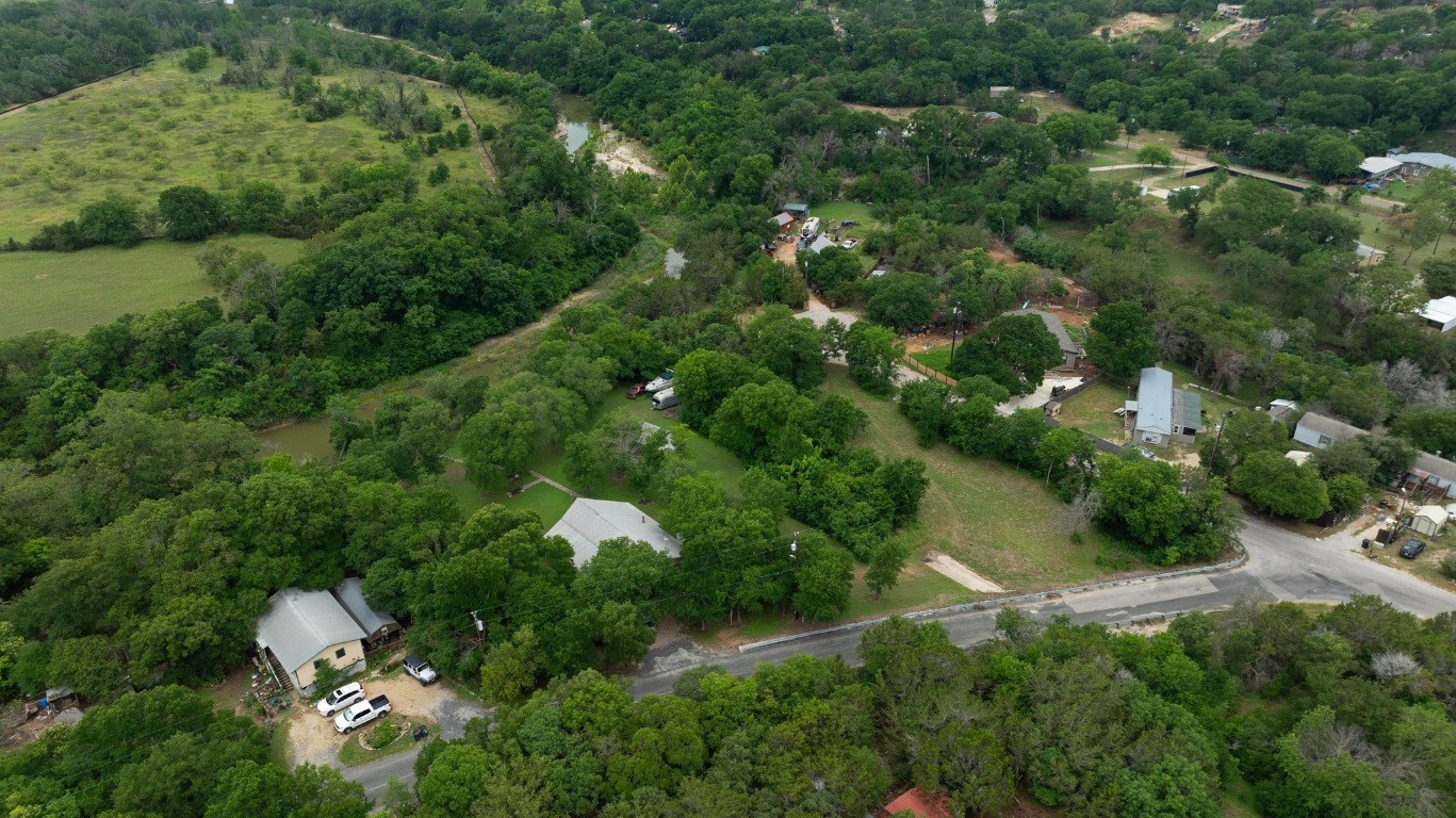 101 River Road Liberty Hill, TX 78642 - Photo 13 of 21 an aerial view of residential house with outdoor space and trees all around