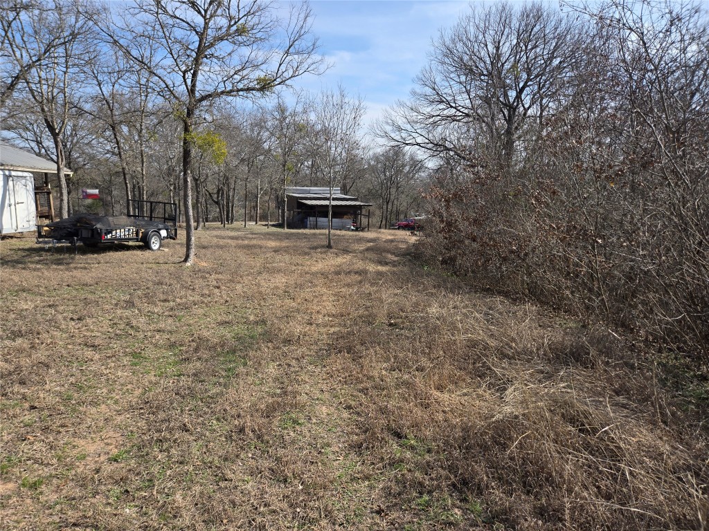 101 River Road Liberty Hill, TX 78642 - Photo 20 of 21 a view of road with trees