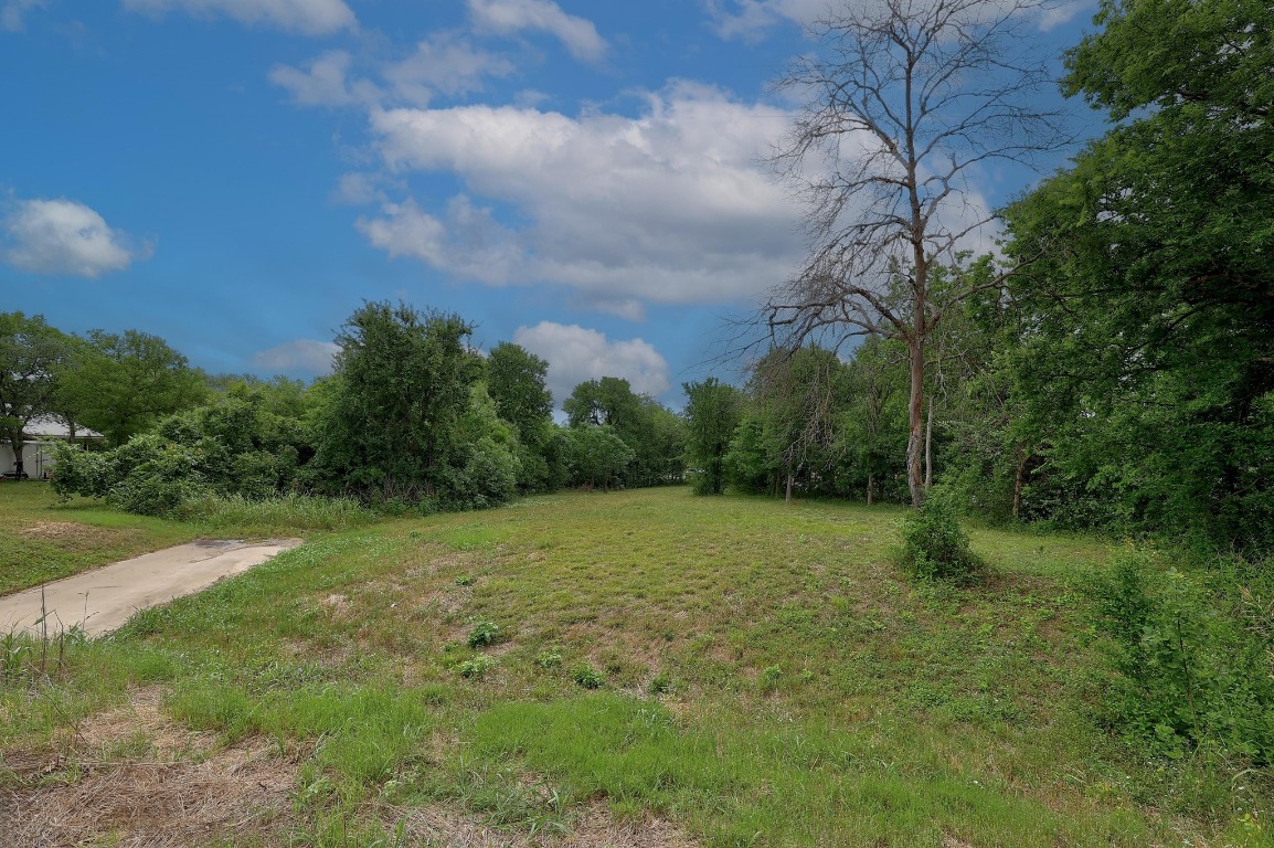 101 River Road Liberty Hill, TX 78642 - Photo 5 of 21 a view of a big yard with a house