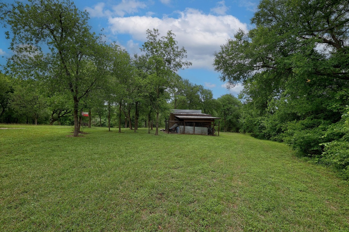 101 River Road Liberty Hill, TX 78642 - Photo 9 of 21 a view of outdoor space with deck and yard