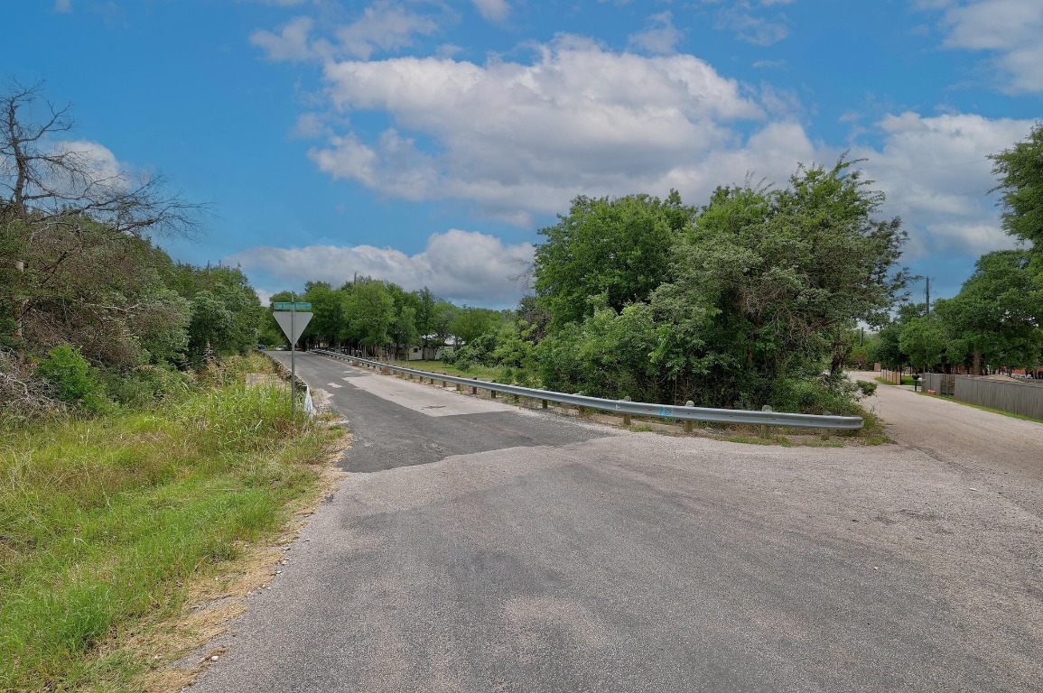 101 River Road Liberty Hill, TX 78642 - Photo 10 of 21 a view of a road with houses in the background