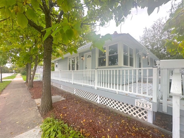 17833 Harwood Avenue Homewood, IL 60430 - Photo 1 of 12 a view of a house with a small yard