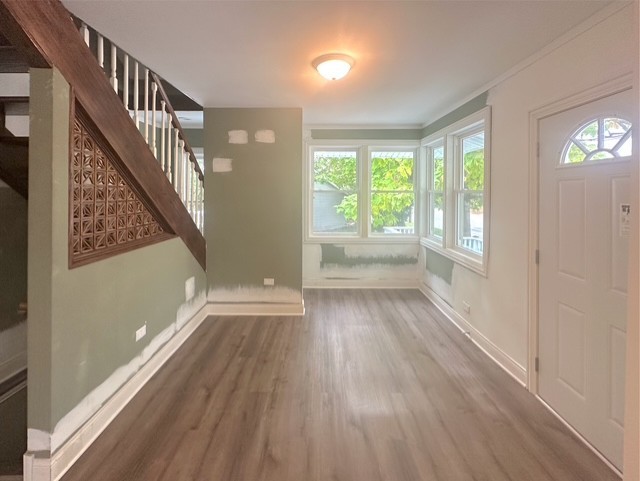 17833 Harwood Avenue Homewood, IL 60430 - Photo 2 of 12 a view of an entryway with wooden floor