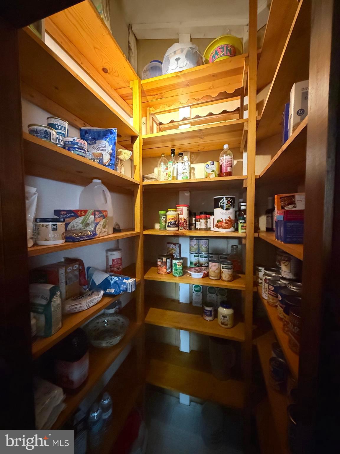 1545 East Buckshutem Road Millville, NJ 08332 - Photo 15 of 41 a room with lots of different colored cloths