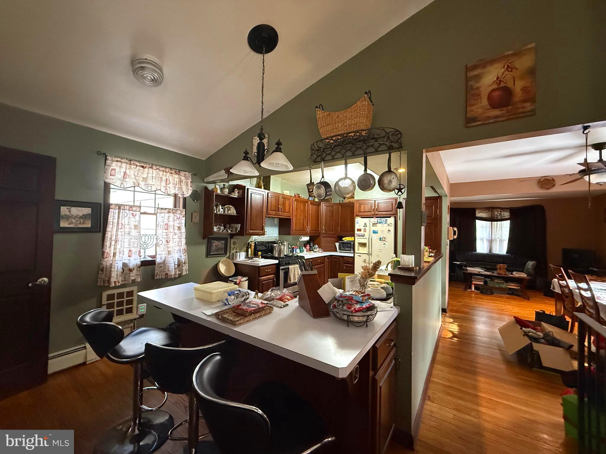 1545 East Buckshutem Road Millville, NJ 08332 - Photo 6 of 41 a view of a dining room with furniture window and wooden floor