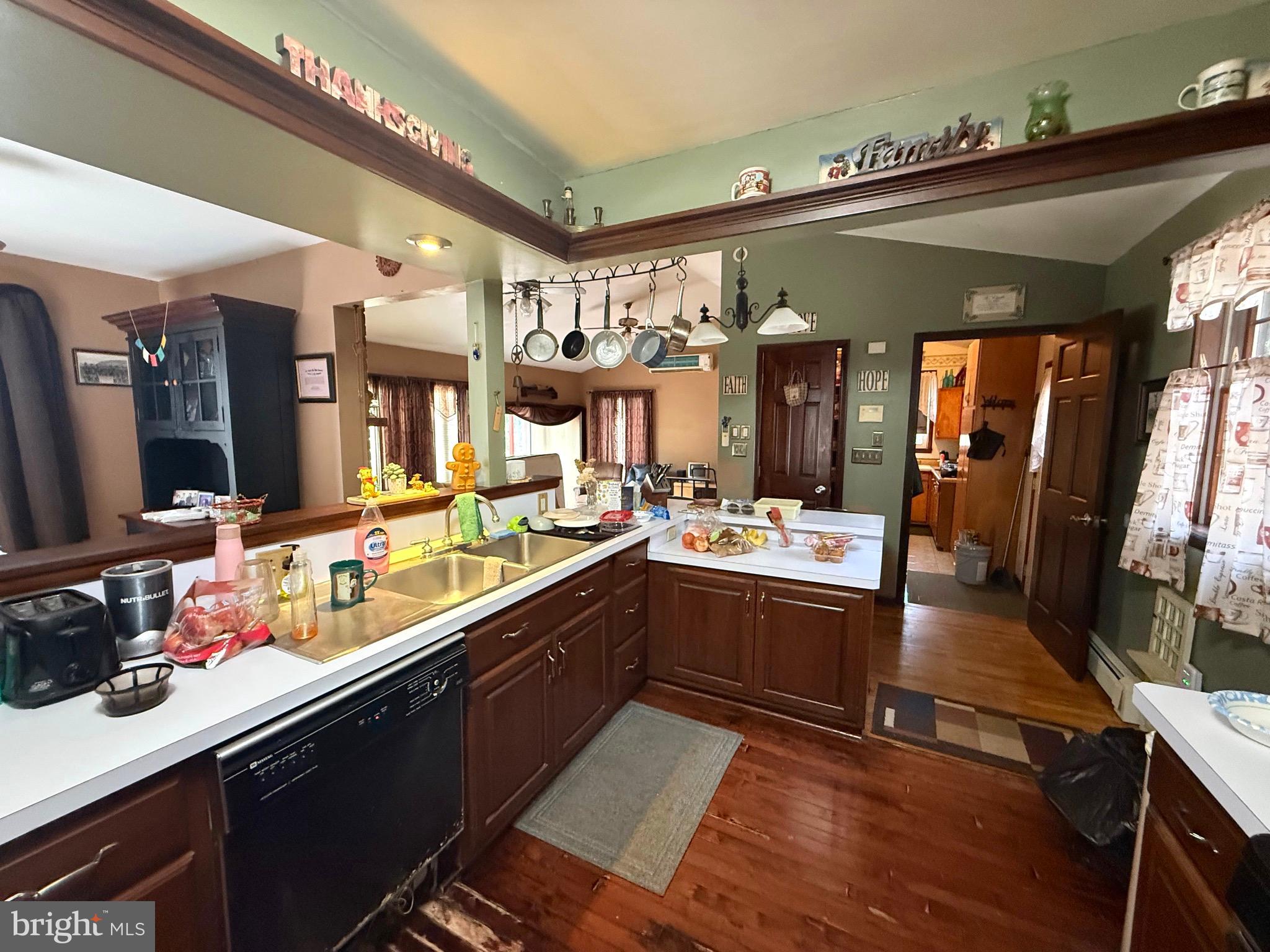 1545 East Buckshutem Road Millville, NJ 08332 - Photo 7 of 41 a large kitchen with a large counter top appliances and cabinets