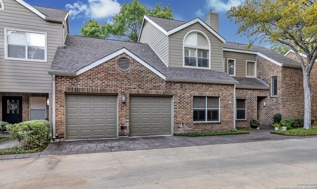 a view of outdoor space yard and front view of a house