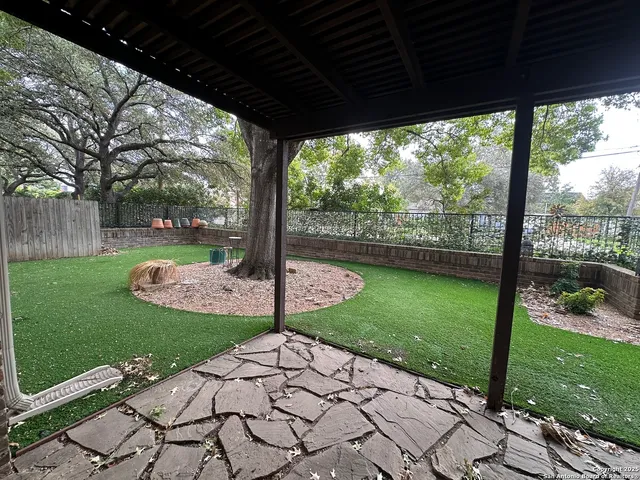 a view of a porch with a backyard