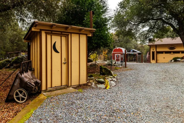 a kitchen with a sink stainless steel appliances and cabinets