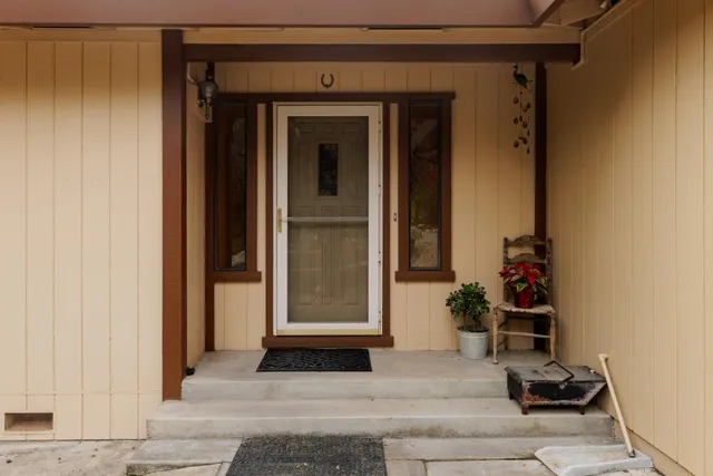 a bathroom with a bathtub and a window