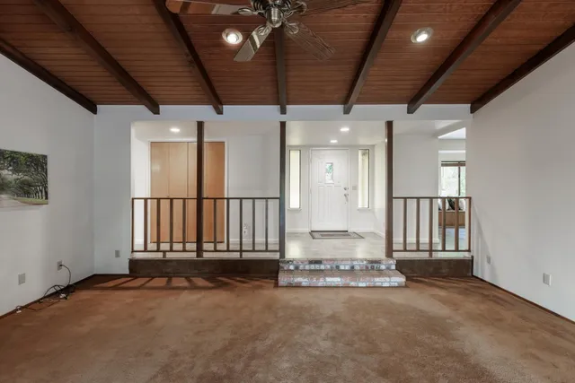 a bathroom with a bathtub shower sink and toilet