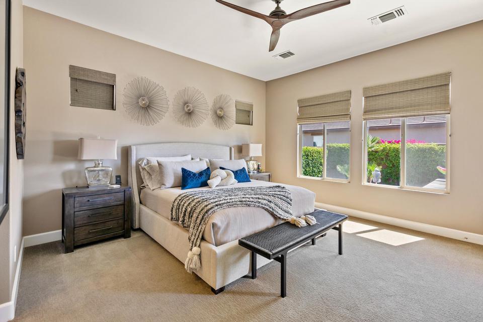 51790 South Two Palms Way Indio, CA 92201 - Photo 13 of 36 a bed sitting in a bedroom next to a window