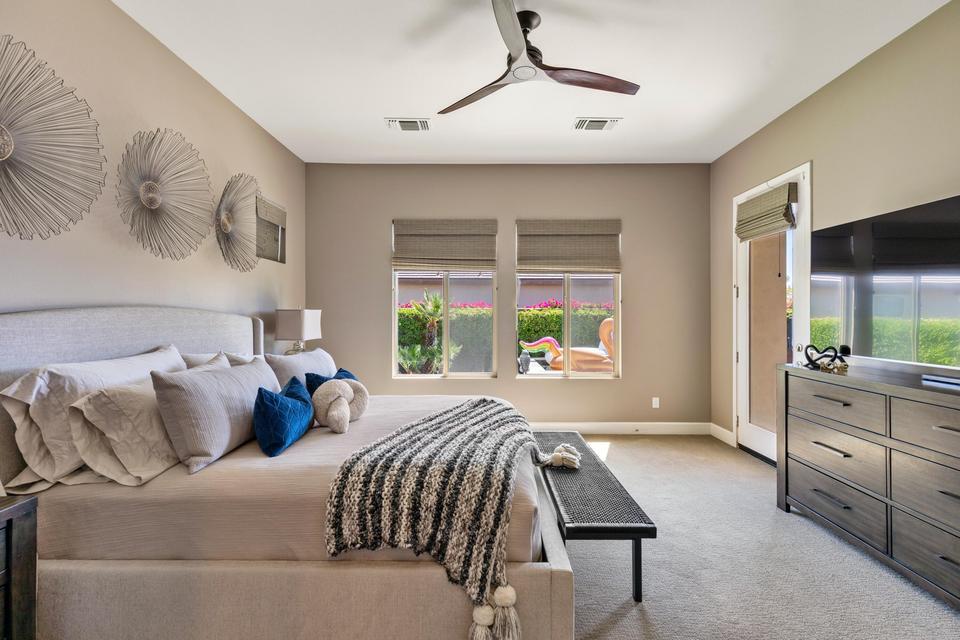 51790 South Two Palms Way Indio, CA 92201 - Photo 14 of 36 a bed room with a bed and a window