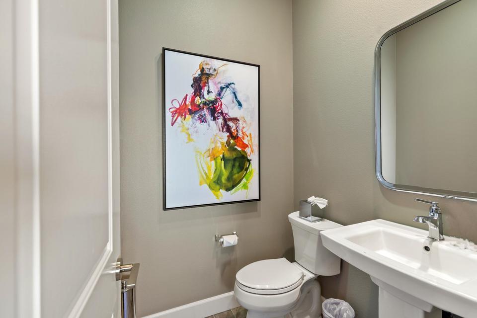 51790 South Two Palms Way Indio, CA 92201 - Photo 24 of 36 a bathroom with a toilet and sink