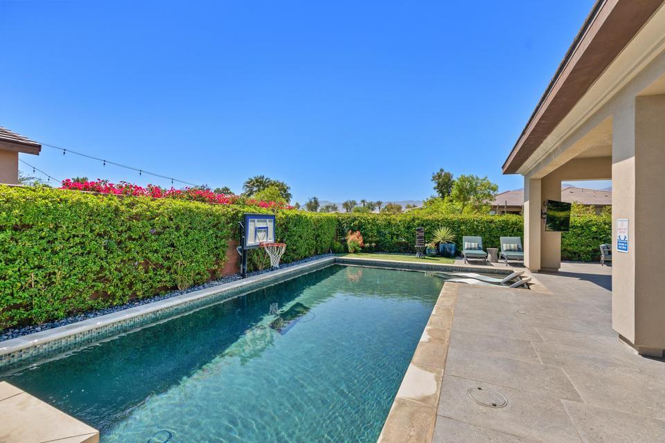 51790 South Two Palms Way Indio, CA 92201 - Photo 28 of 36 a view of swimming pool with a yard