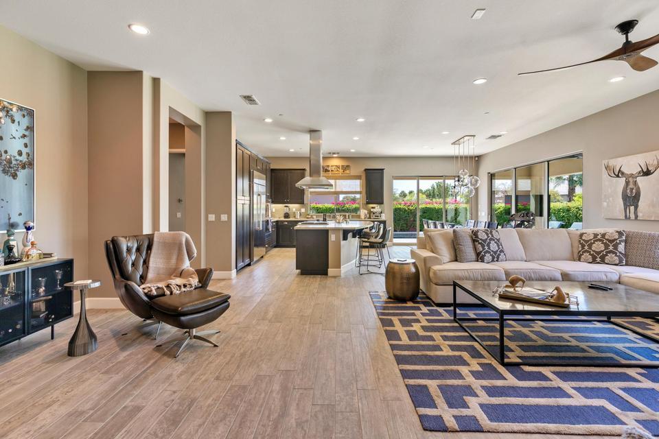 51790 South Two Palms Way Indio, CA 92201 - Photo 3 of 36 a living room with lots of furniture and a rug