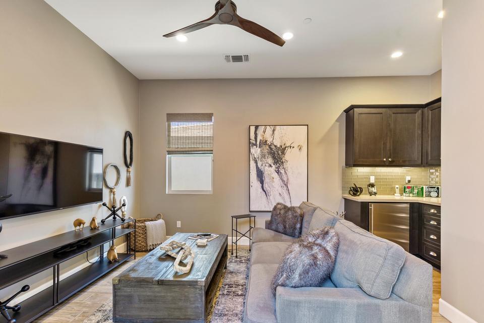 51790 South Two Palms Way Indio, CA 92201 - Photo 4 of 36 a living room with furniture and a flat screen tv