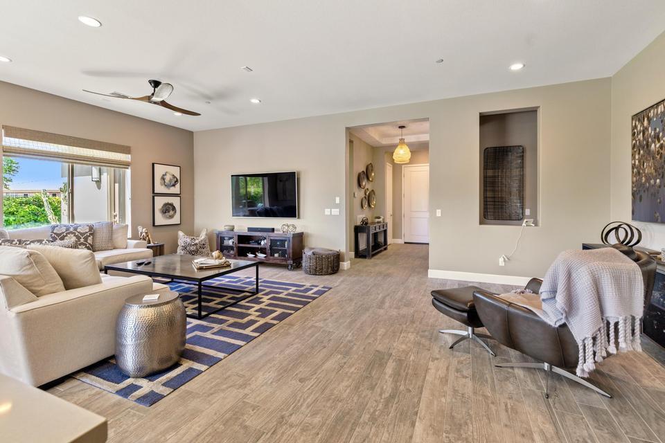 51790 South Two Palms Way Indio, CA 92201 - Photo 6 of 36 a living room with furniture and wooden floor