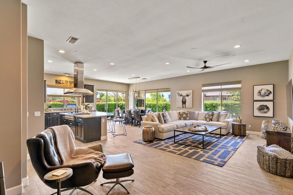51790 South Two Palms Way Indio, CA 92201 - Photo 7 of 36 a living room with furniture or couch and a large window