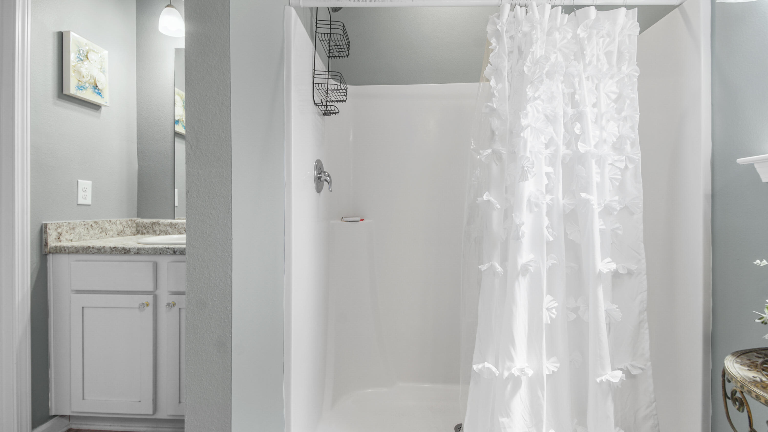 41 Woodsorrel Street Freeport, FL 32439 - Photo 12 of 41 a bathroom with a shower and a sink
