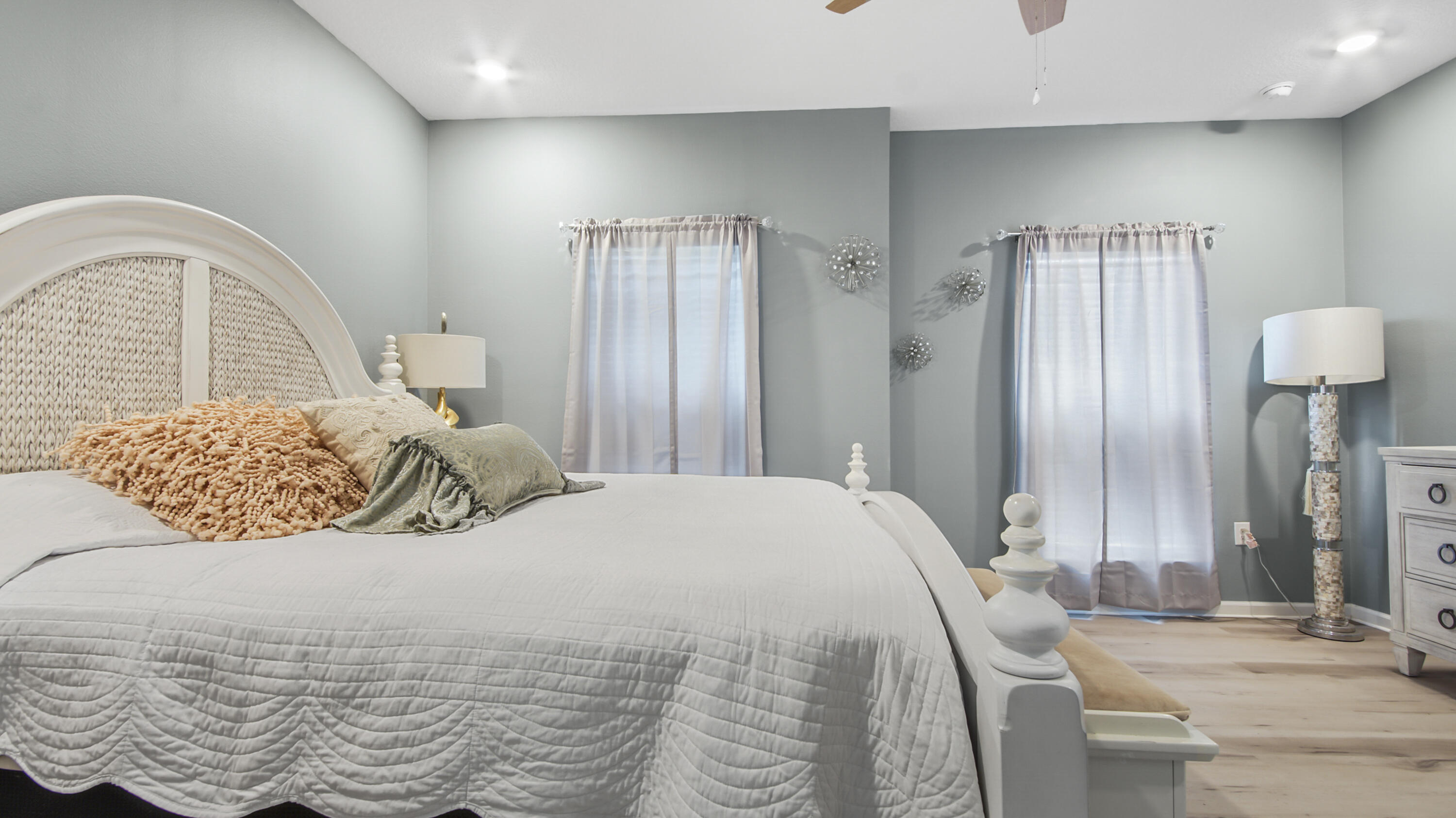 41 Woodsorrel Street Freeport, FL 32439 - Photo 13 of 41 a bedroom with a bed and a mirror