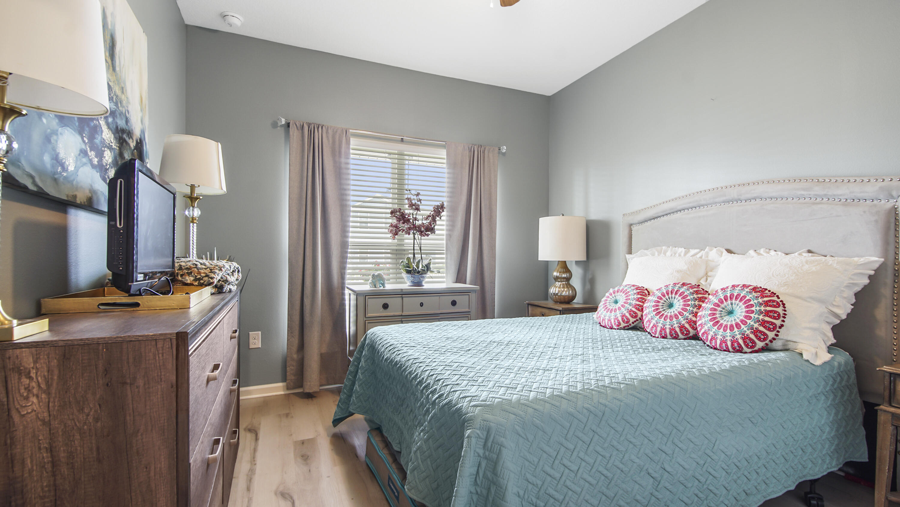 41 Woodsorrel Street Freeport, FL 32439 - Photo 17 of 41 a bedroom with a bed dresser and a window