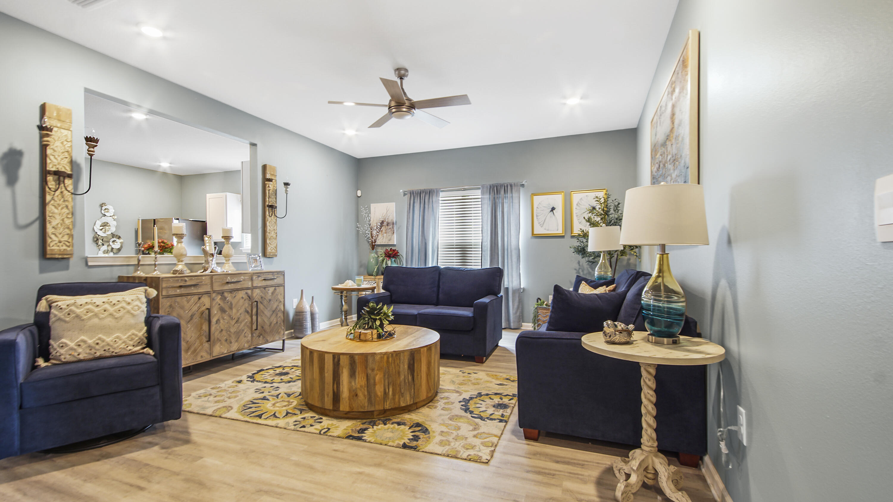 41 Woodsorrel Street Freeport, FL 32439 - Photo 21 of 41 a living room with furniture and a mirror