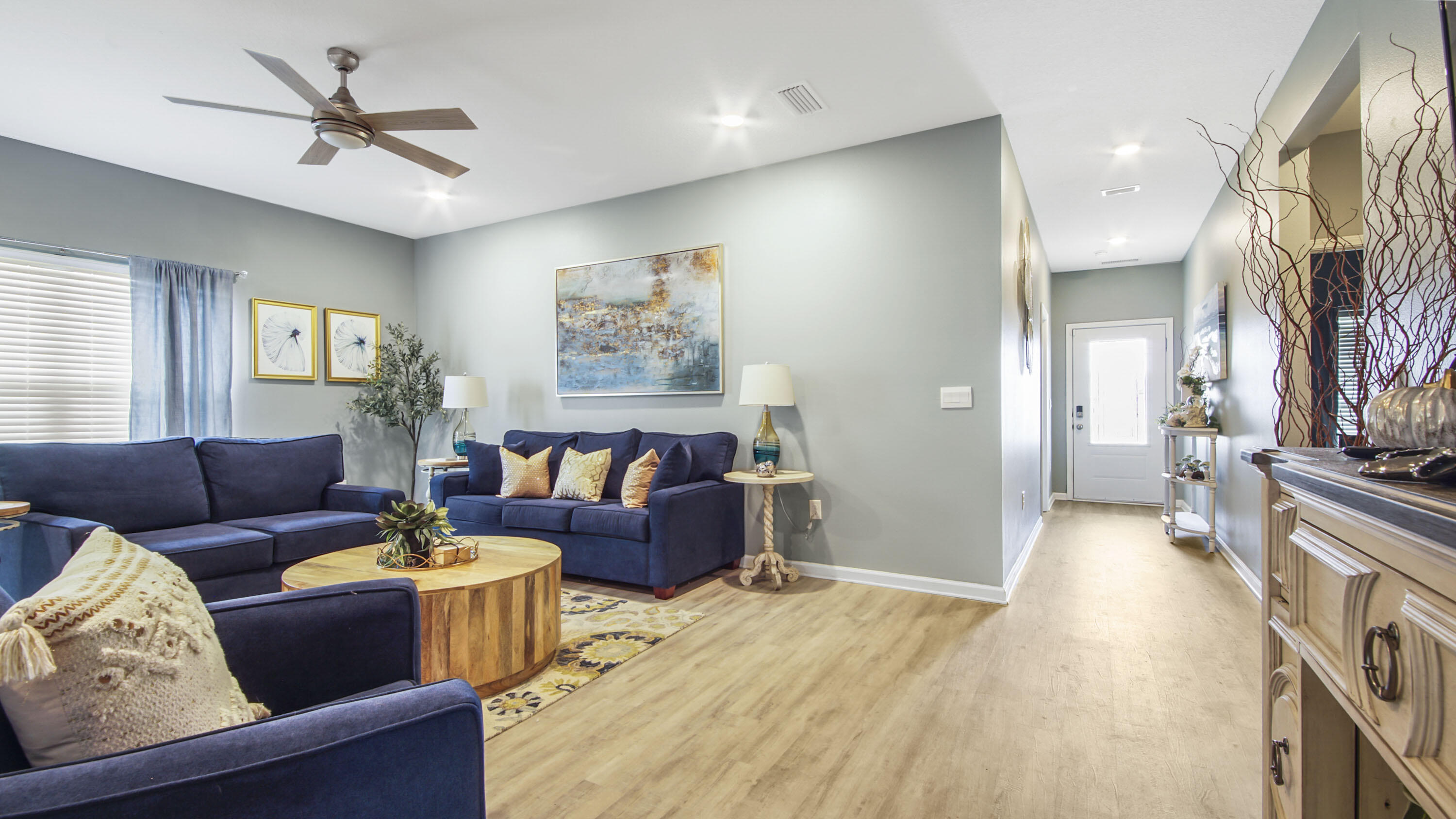 41 Woodsorrel Street Freeport, FL 32439 - Photo 22 of 41 a living room with furniture and a chandelier
