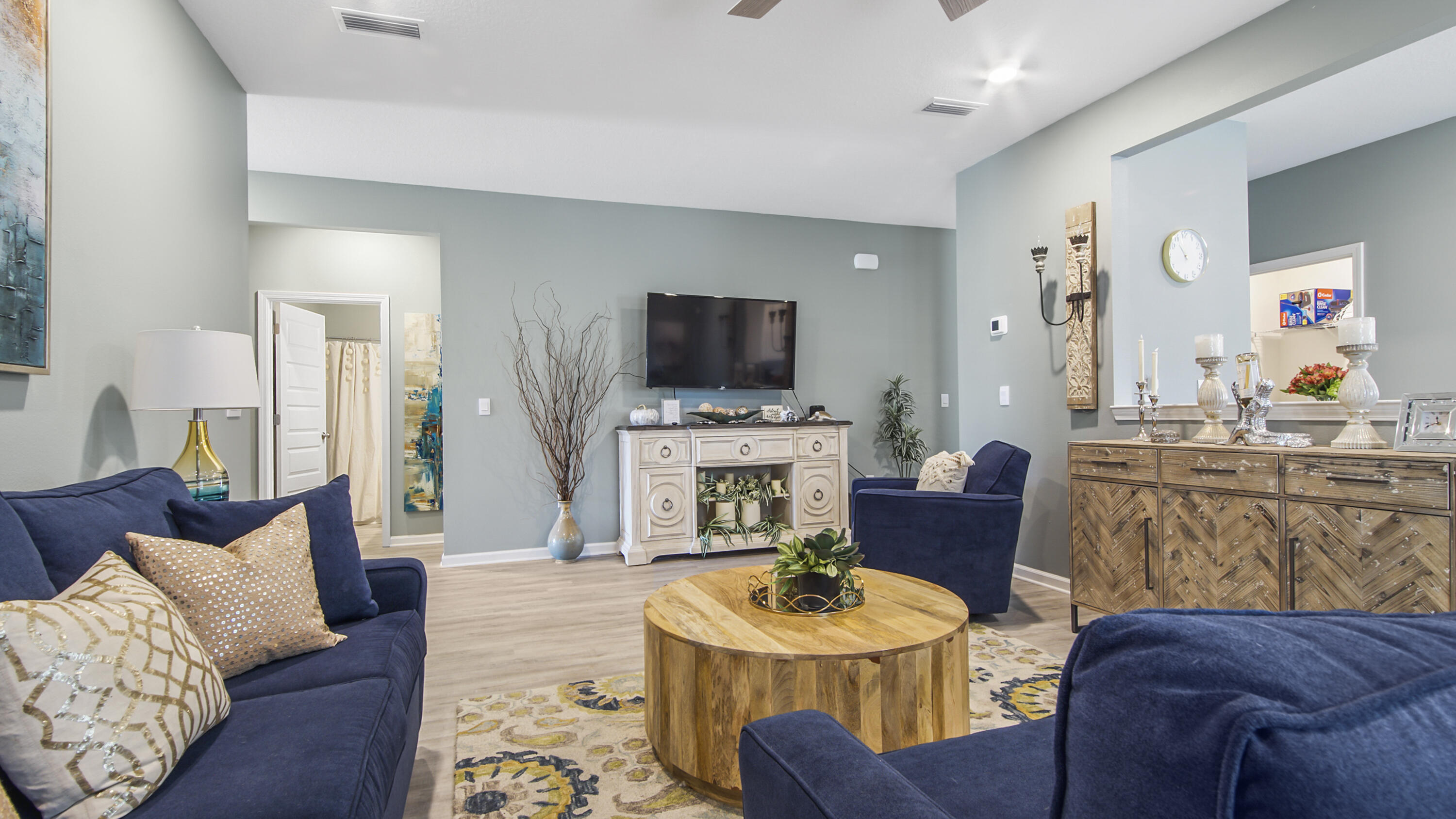 41 Woodsorrel Street Freeport, FL 32439 - Photo 24 of 41 a living room with furniture and a flat screen tv