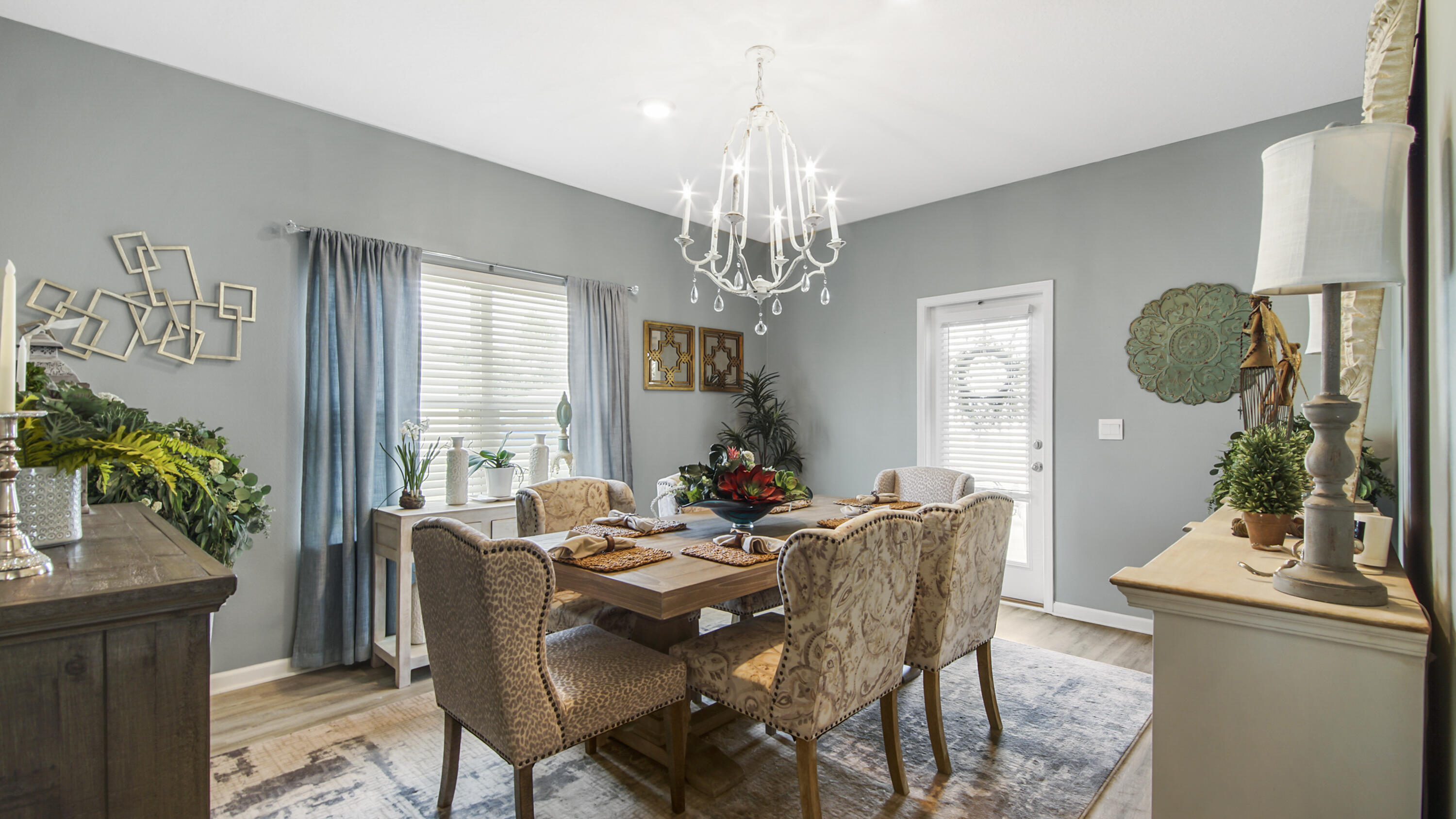 41 Woodsorrel Street Freeport, FL 32439 - Photo 25 of 41 a view of a dining room with furniture window and wooden floor