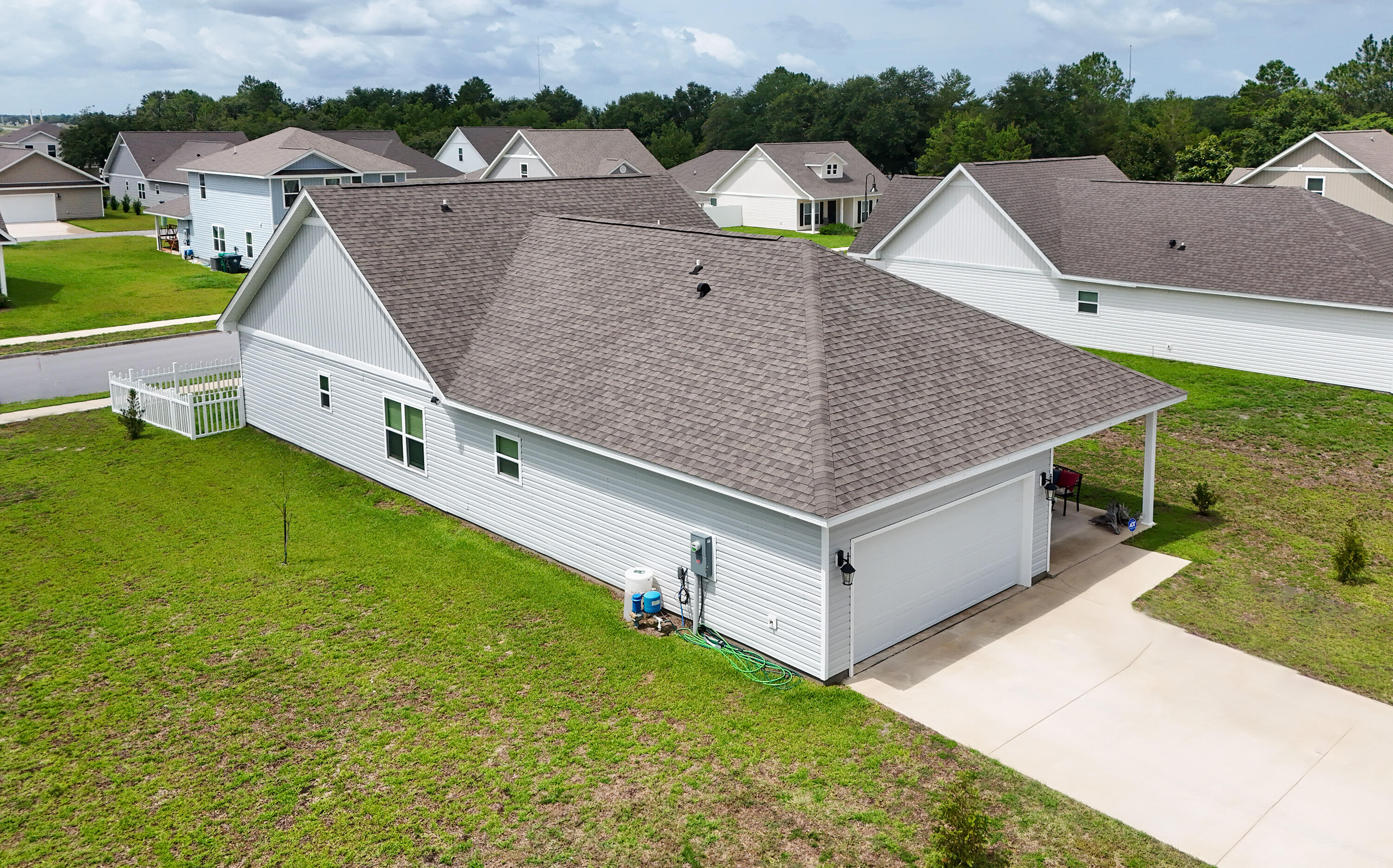 41 Woodsorrel Street Freeport, FL 32439 - Photo 3 of 41 an aerial view of residential houses with outdoor space and seating