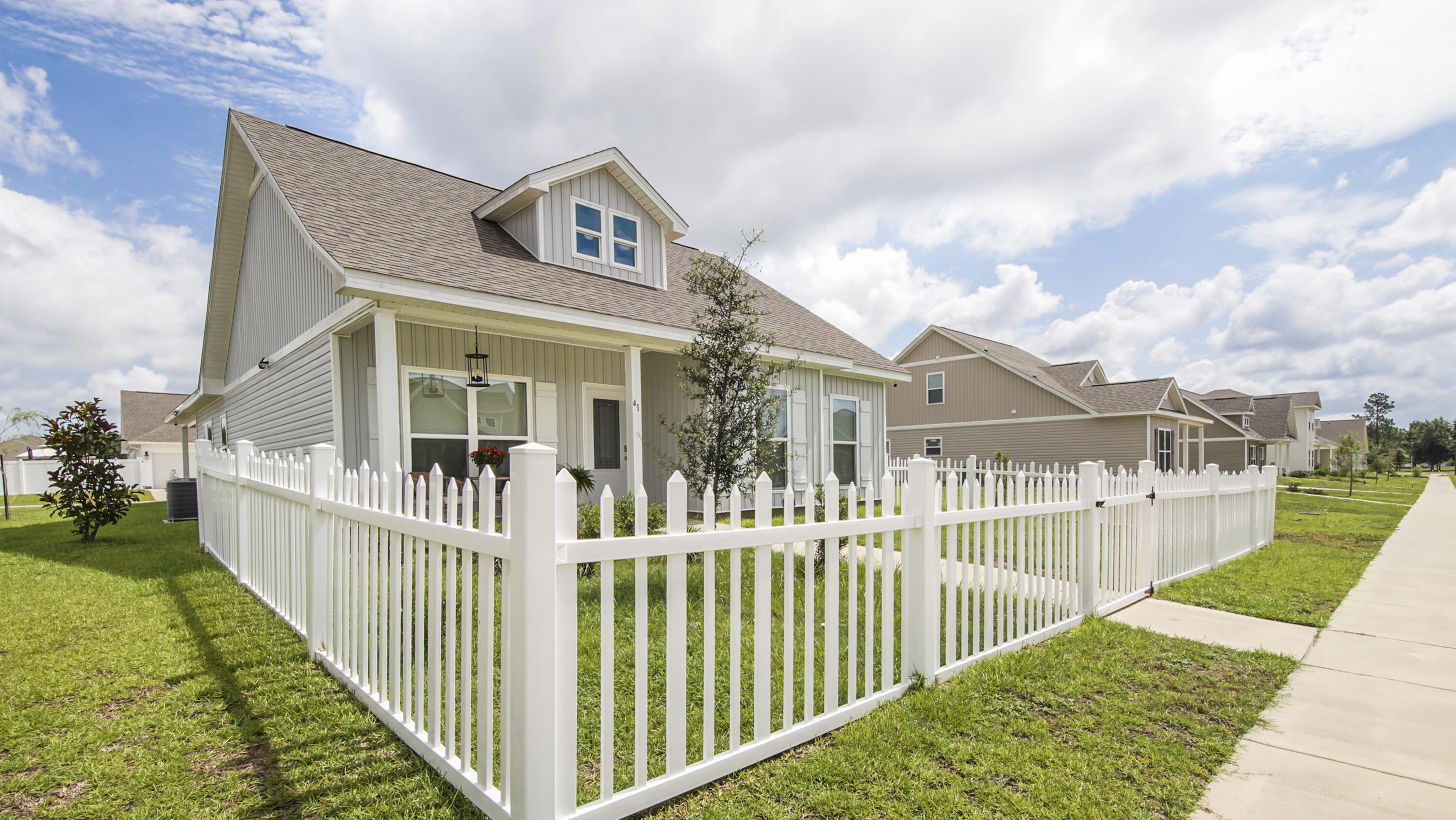 41 Woodsorrel Street Freeport, FL 32439 - Photo 4 of 41 a view of a house with wooden fence