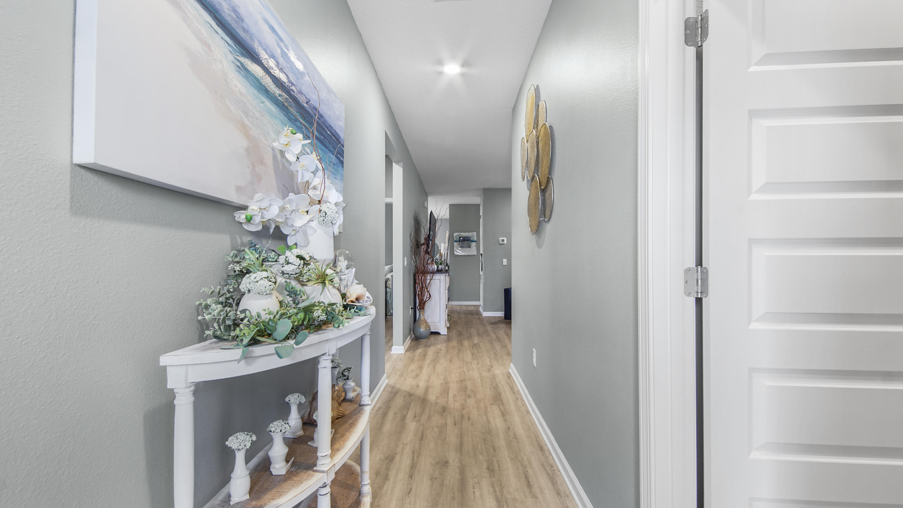 41 Woodsorrel Street Freeport, FL 32439 - Photo 6 of 41 a view of a hallway and wooden floor