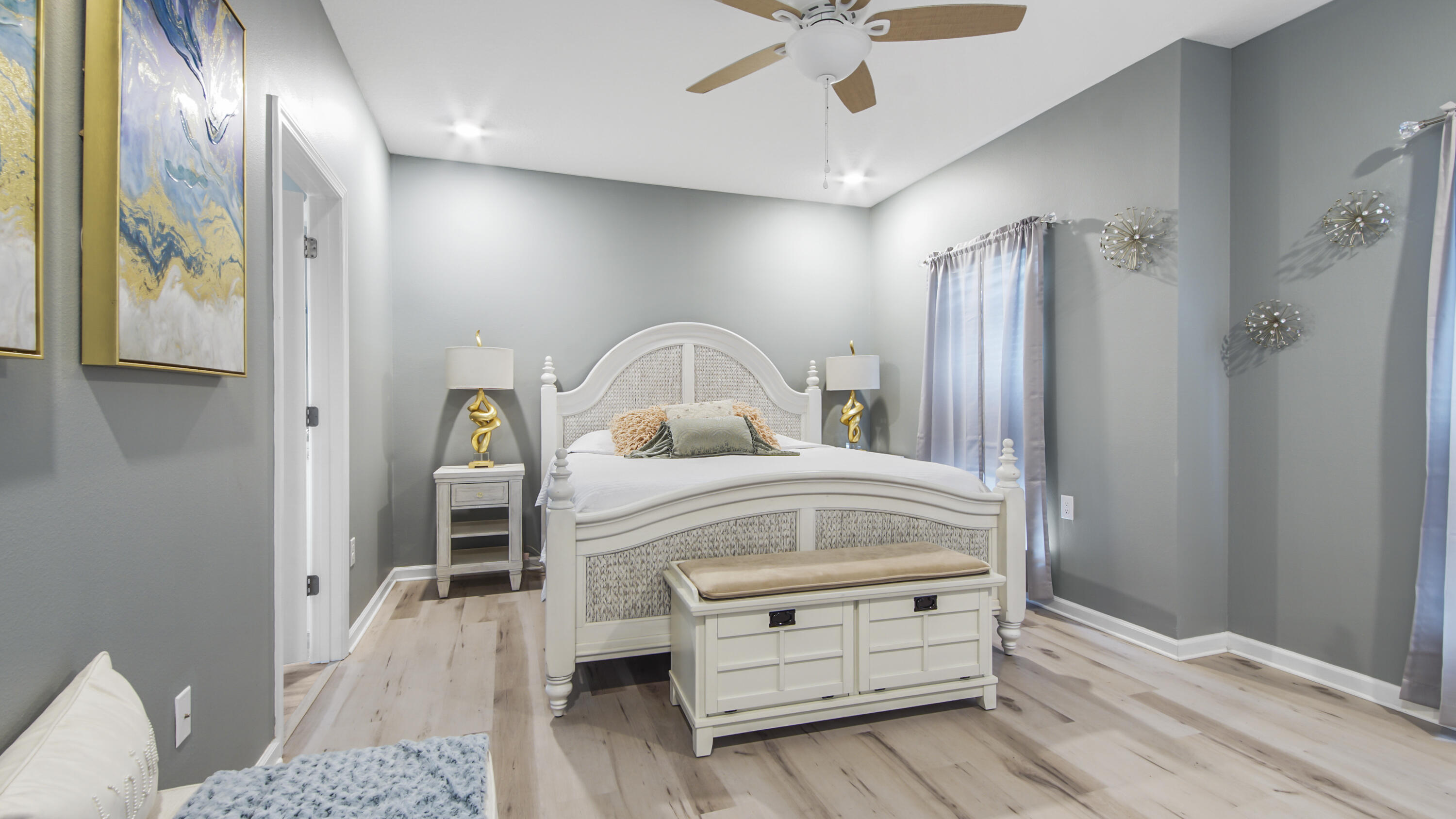 41 Woodsorrel Street Freeport, FL 32439 - Photo 7 of 41 a bedroom with a bed and a dresser