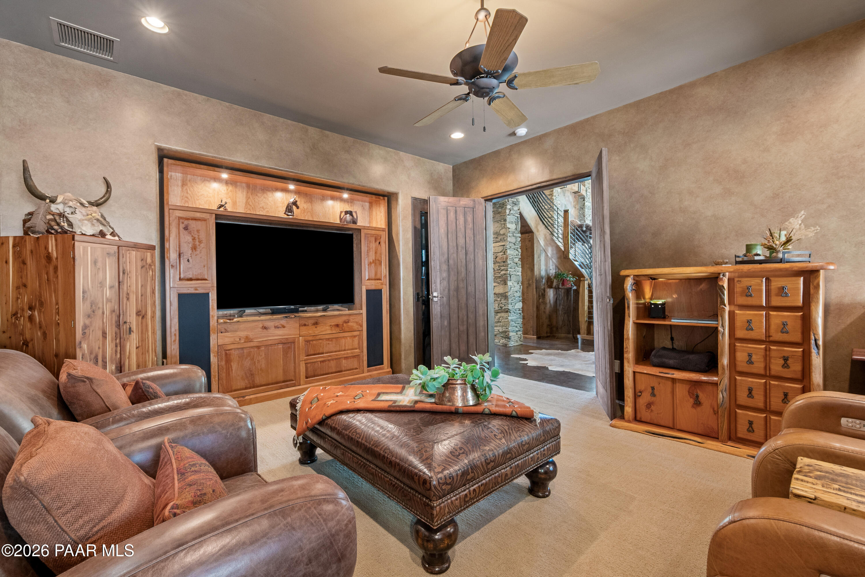1515 High Valley Ranch Road Prescott, AZ 86303 - Photo 34 of 76 a living room with furniture and a flat screen tv